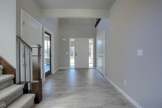 entrance foyer with beamed ceiling