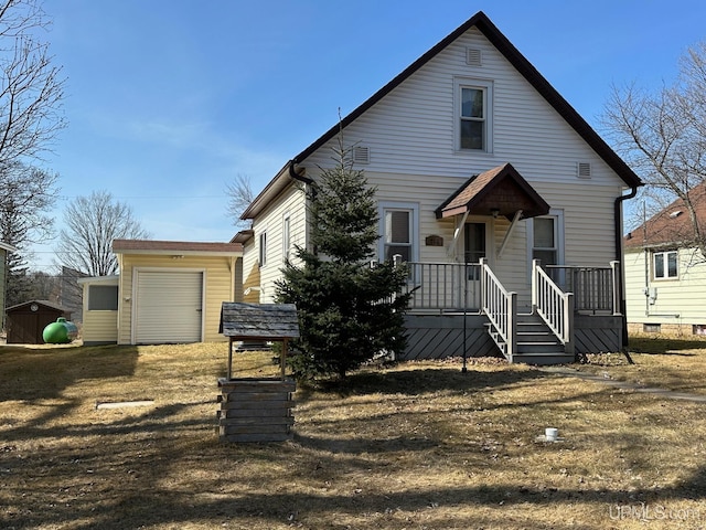 view of front facade with a storage unit