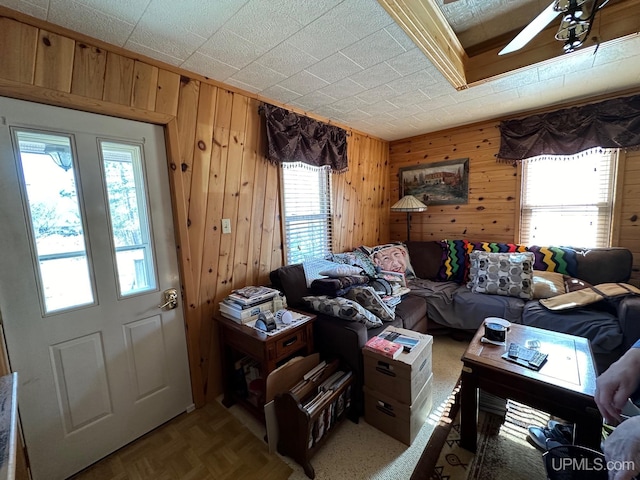 interior space with plenty of natural light and ceiling fan