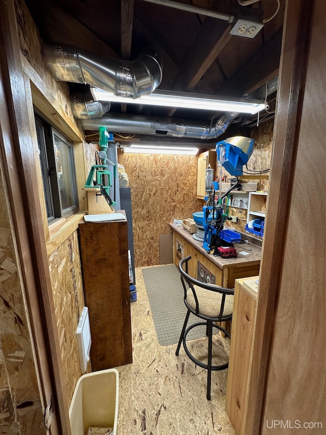 basement with a workshop area