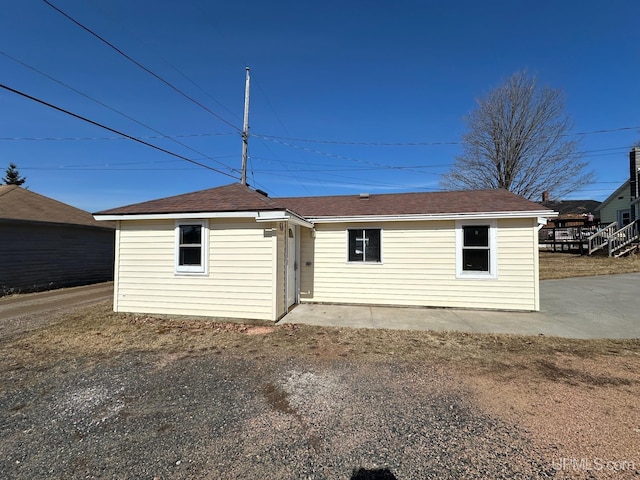 back of property featuring a patio area