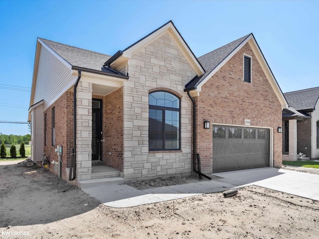 view of front of property featuring a garage