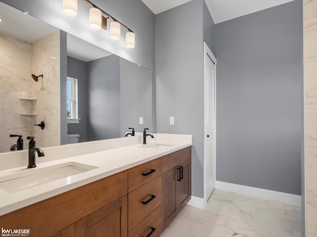 unfurnished bedroom with ensuite bathroom and light wood-type flooring