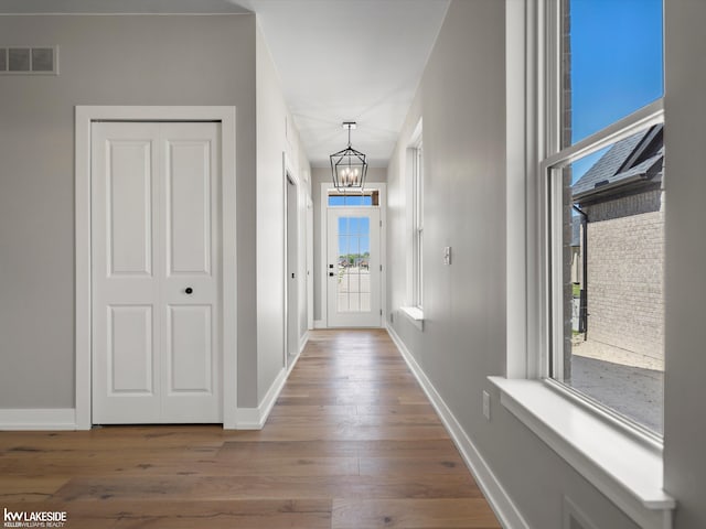 rear view of property featuring a patio and central AC unit