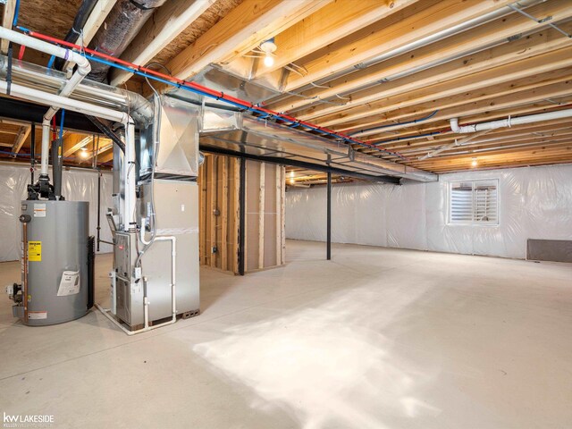 basement with heating unit and water heater