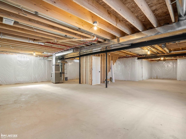 basement with heating unit