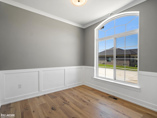 hall featuring hardwood / wood-style floors and an inviting chandelier