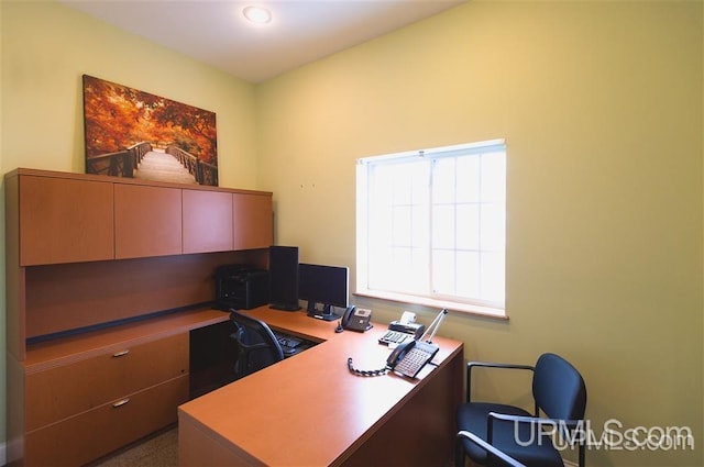 home office featuring plenty of natural light