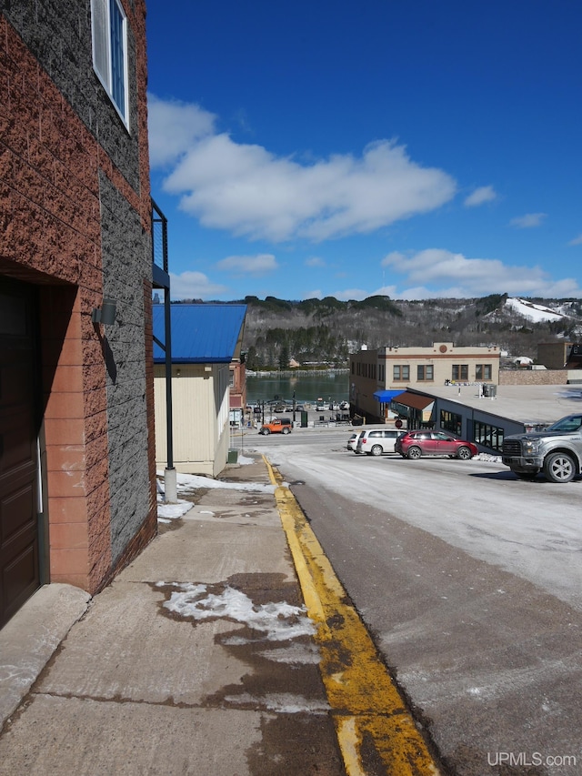 exterior space featuring a mountain view