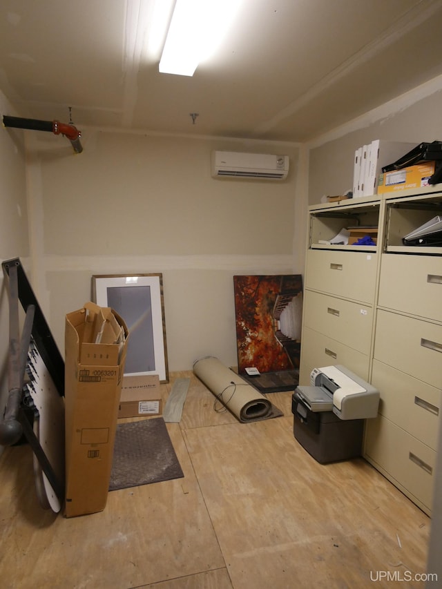 miscellaneous room with a wall mounted air conditioner