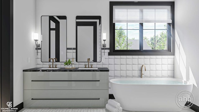 bathroom with a washtub, double sink, vanity with extensive cabinet space, tile walls, and tile flooring