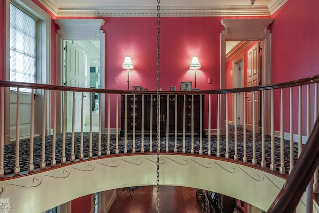 interior space with crown molding