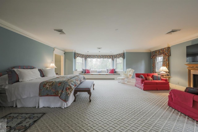 bedroom featuring crown molding and light carpet