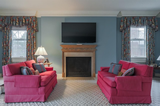 living room featuring plenty of natural light and ornamental molding