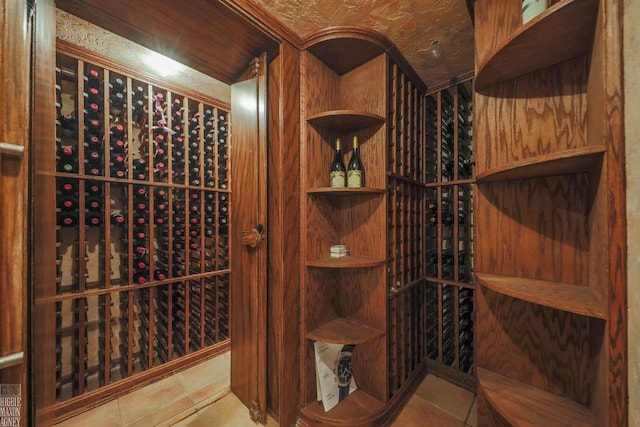 wine cellar with light tile flooring