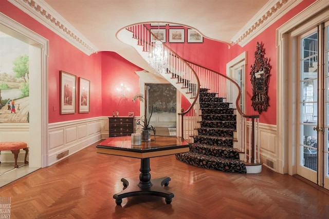 interior space featuring dark parquet floors and crown molding