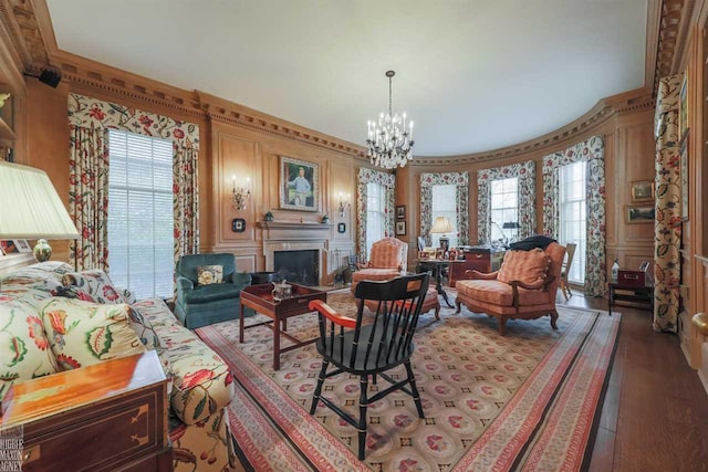 living room with a chandelier and dark hardwood / wood-style flooring