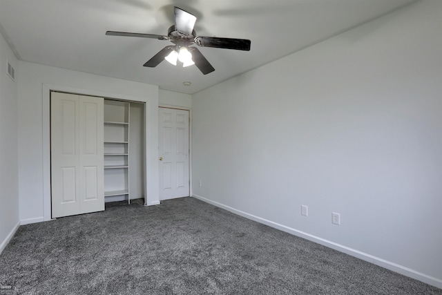 unfurnished bedroom featuring a closet, ceiling fan, and dark colored carpet