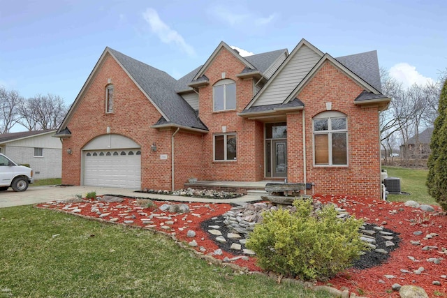 front facade featuring central AC and a front yard