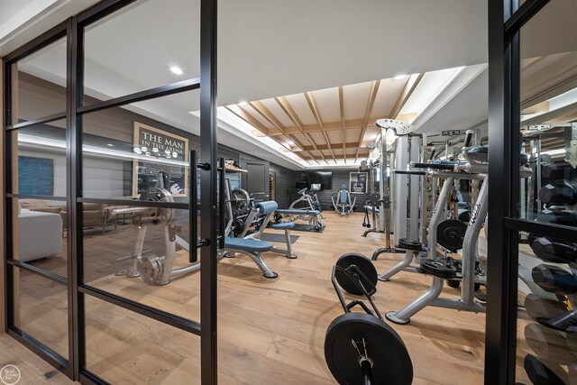 gym featuring light hardwood / wood-style flooring