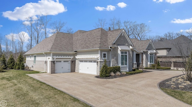 view of front of home with a garage and a front yard