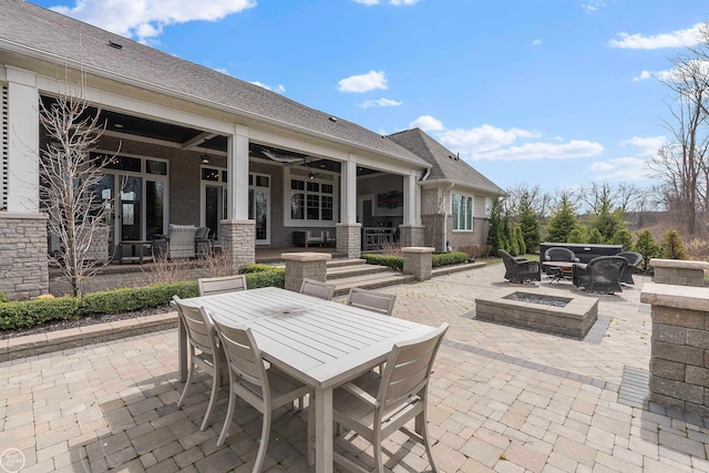 view of patio / terrace featuring ceiling fan