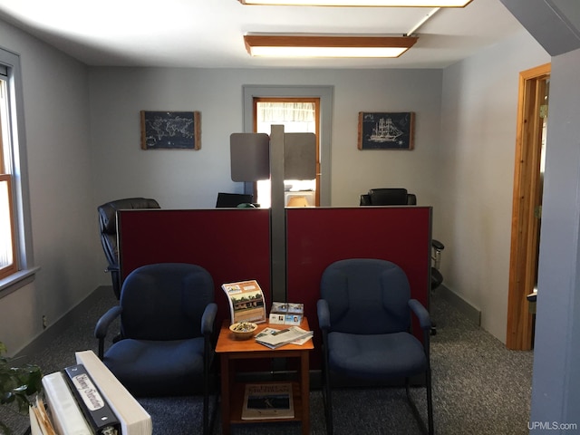 office space featuring dark colored carpet