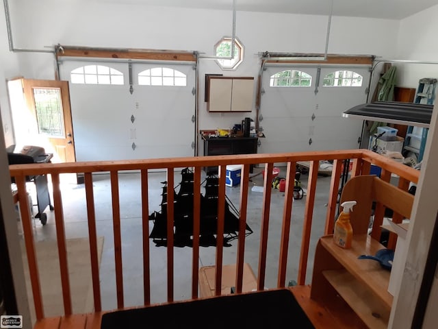 staircase with concrete floors