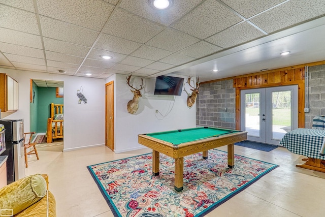 recreation room featuring a drop ceiling, french doors, billiards, and tile flooring