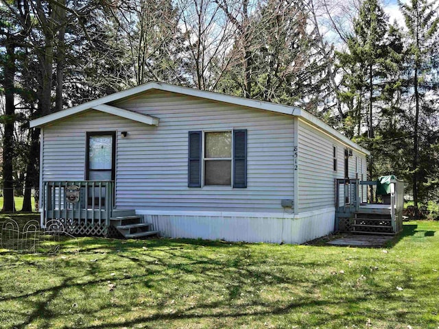 view of front of property with a front lawn