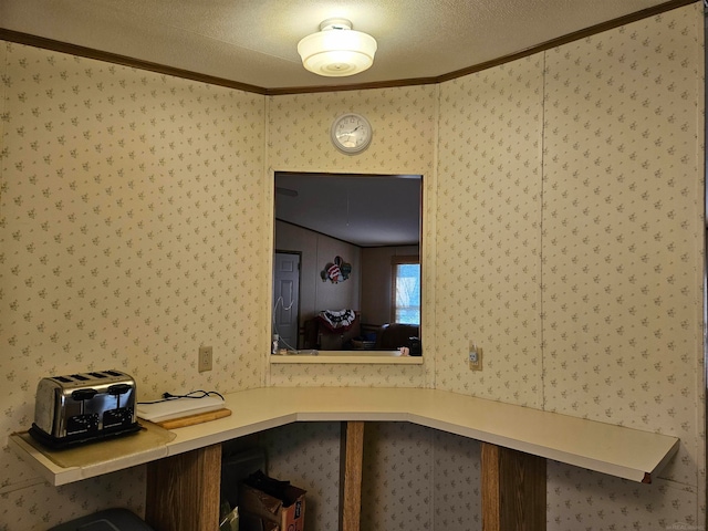 unfurnished office featuring a textured ceiling