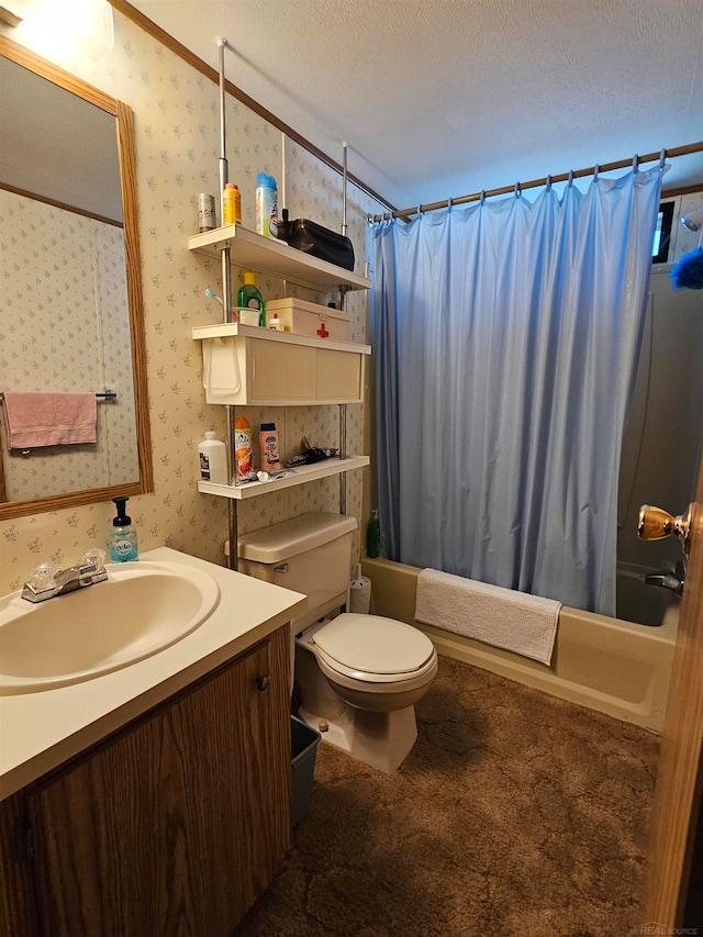 full bathroom with a textured ceiling, vanity, toilet, and shower / bath combo with shower curtain