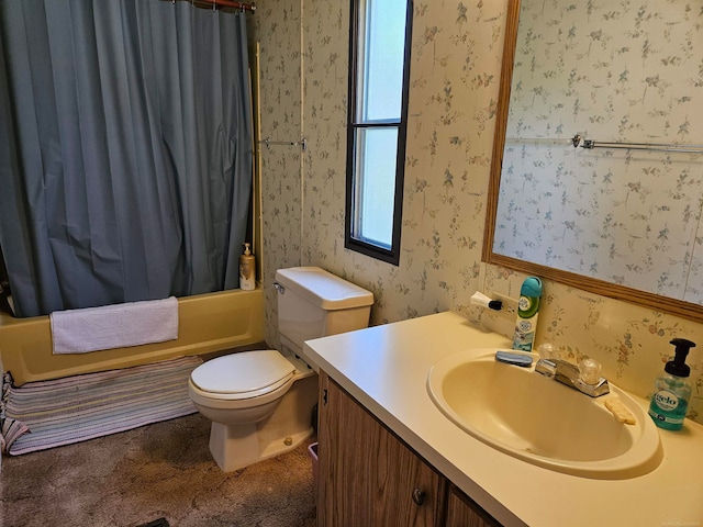 full bathroom with toilet, vanity, and shower / tub combo with curtain