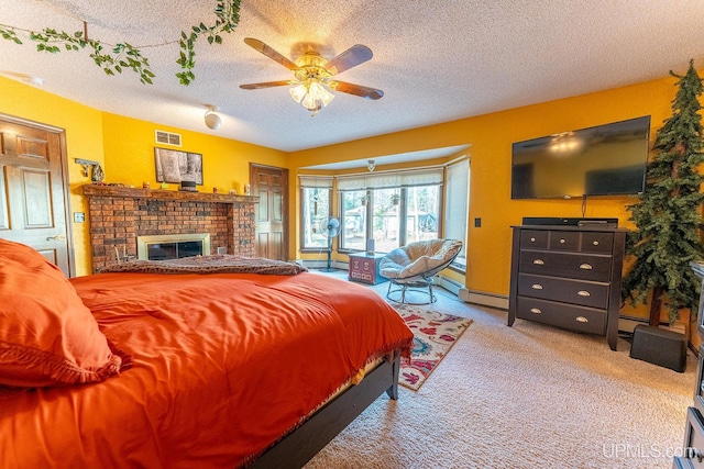 bedroom featuring ceiling fan, a fireplace, light colored carpet, and a textured ceiling