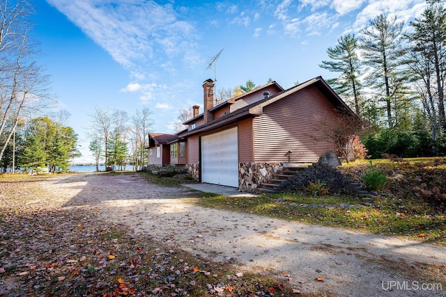 view of home's exterior with a garage