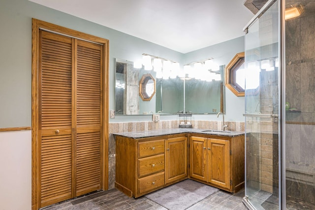 bathroom featuring an enclosed shower, tile flooring, and oversized vanity