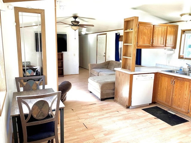 kitchen with ceiling fan, sink, dishwasher, and light wood-type flooring