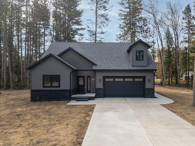 view of front of property with a garage