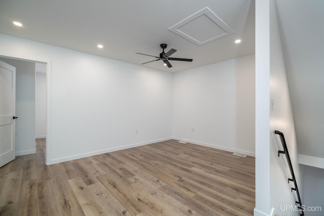 unfurnished room featuring ceiling fan and light hardwood / wood-style flooring