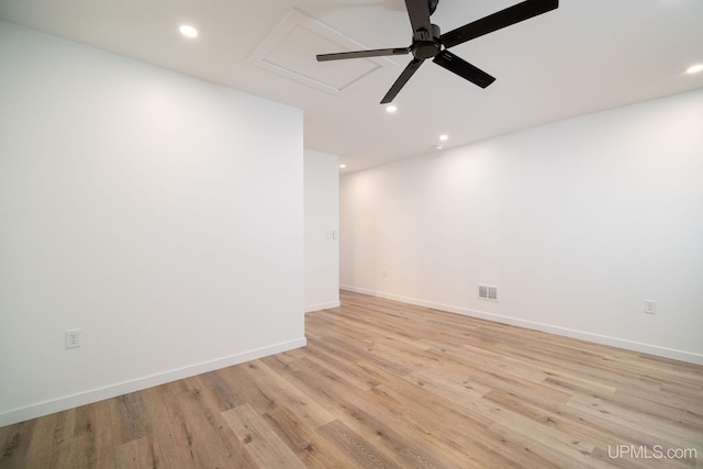 empty room featuring light hardwood / wood-style floors and ceiling fan