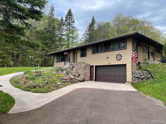 view of front of home featuring a garage