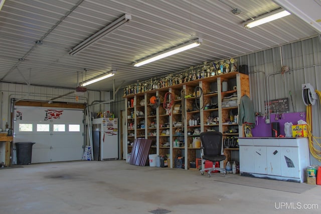 garage featuring white refrigerator