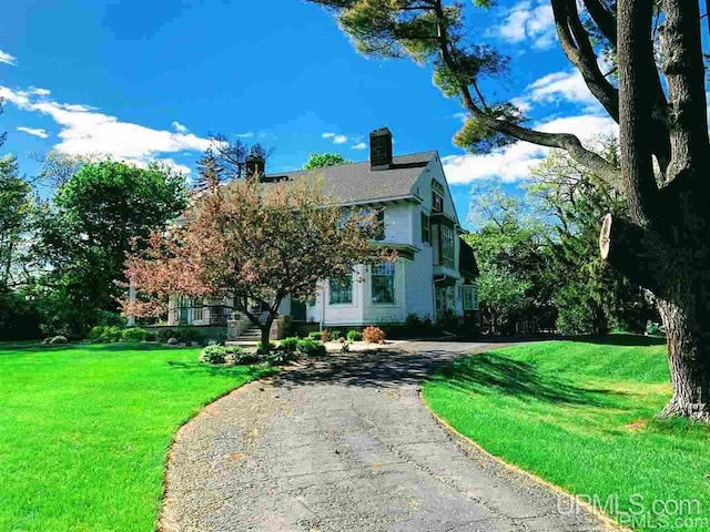 view of front of home with a front yard