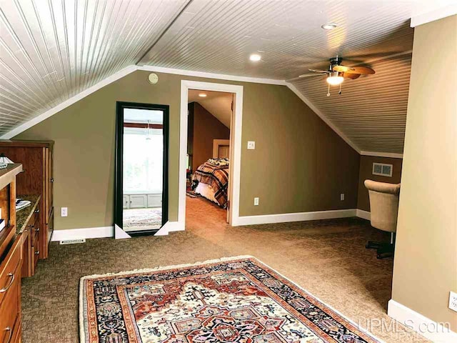 bonus room featuring ceiling fan, carpet floors, and lofted ceiling