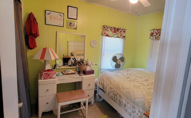 carpeted bedroom featuring ceiling fan