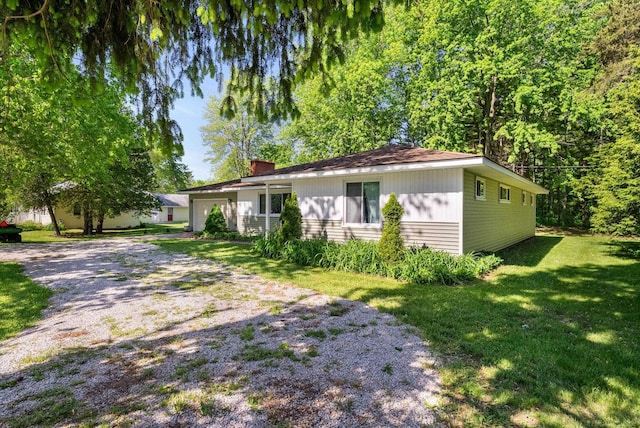 ranch-style home with a front yard