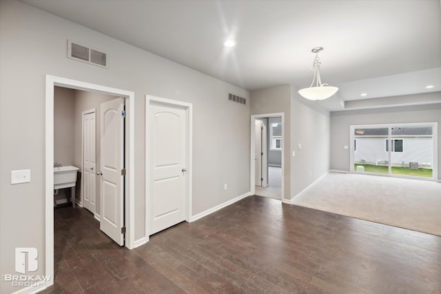 interior space with dark wood-type flooring