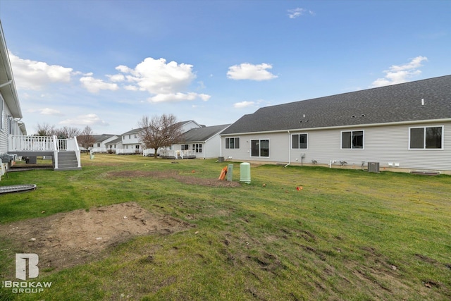 view of yard with a wooden deck