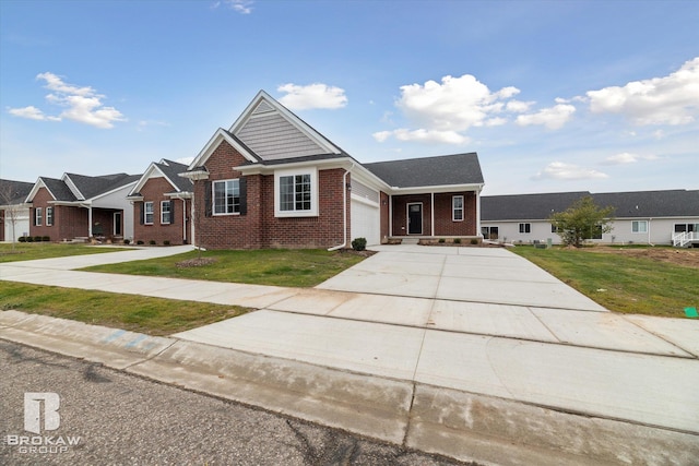 view of front of home with a front lawn and a garage