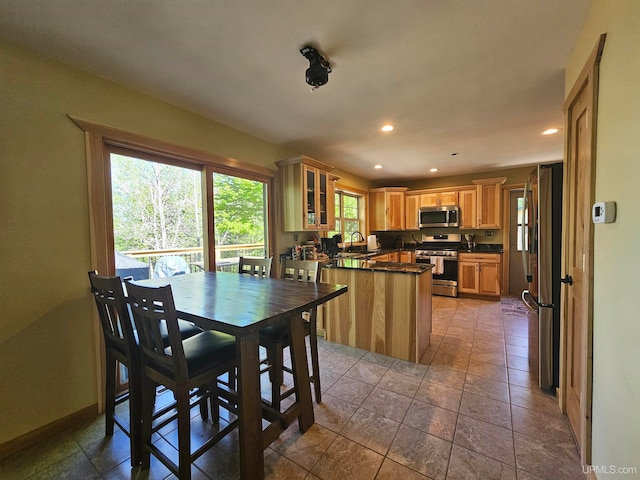 tiled dining space with sink